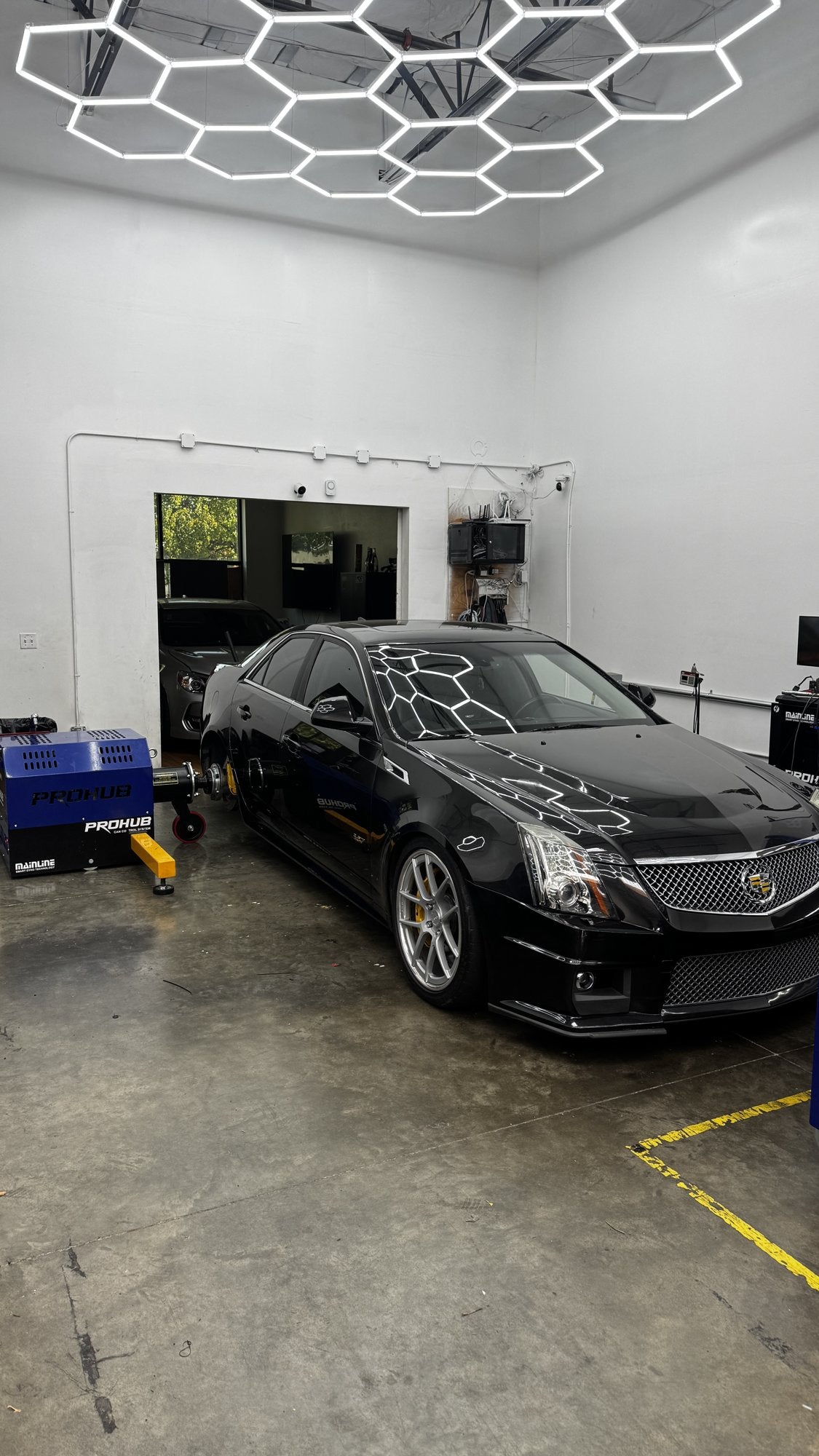 Black Cadillac connected to Mainline ProHub dyno
